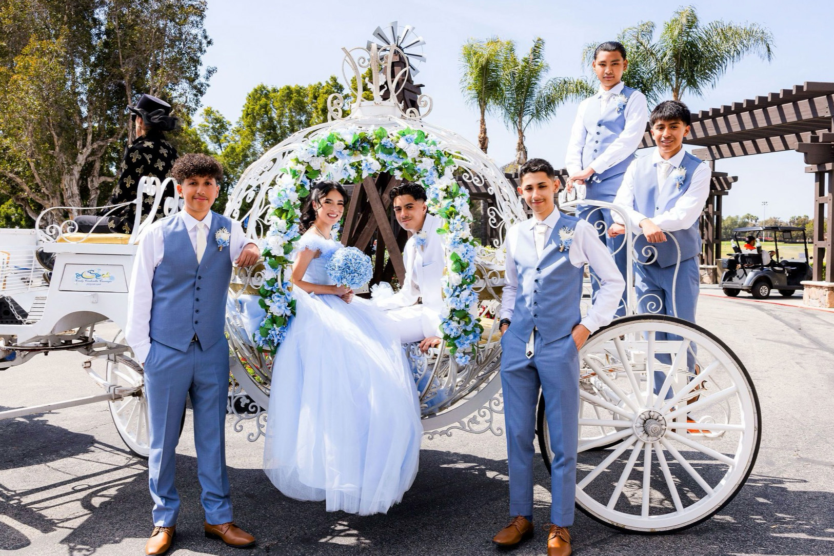 Cinderella carriage creating a memorable specialty moment at a quinceañera